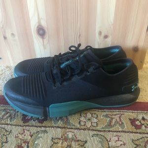 Under Armour Tribase Reign in black men’s size 9.5